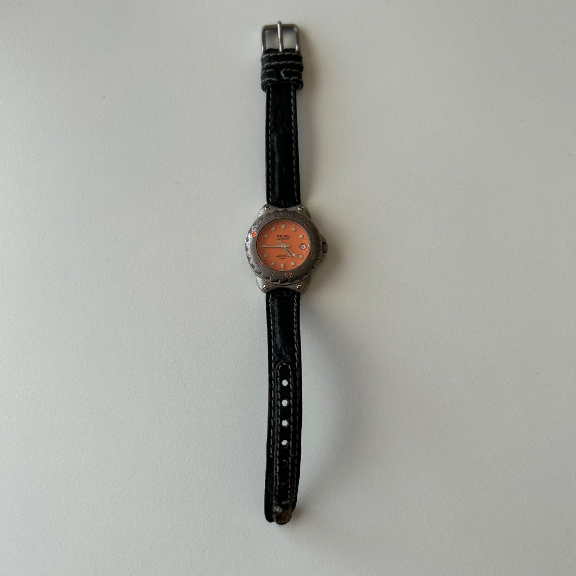 Gruen Womens Stainless Steel Watch With Orange Dial & Black Leather Band